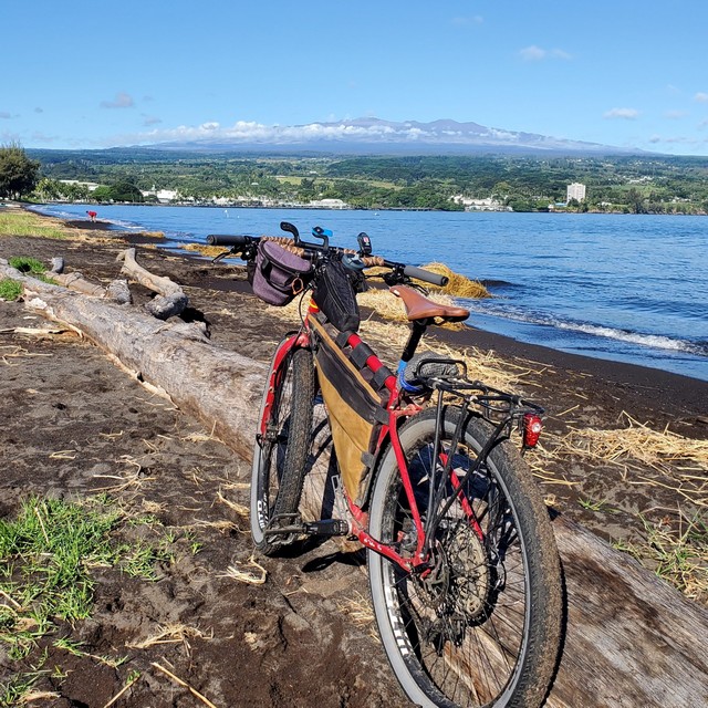 My red bike overlooking Hilo Bay.